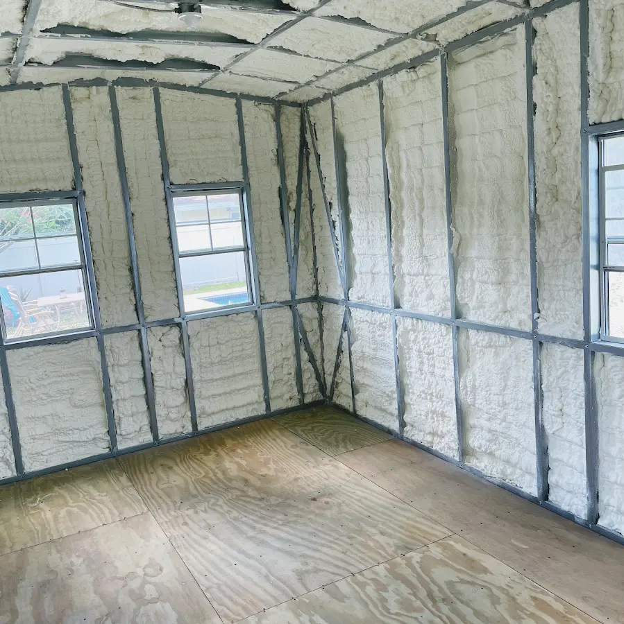 Closed-cell spray foam insulation applied to wall cavities in a residential project in Van Wert